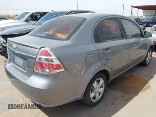 2011 Chevrolet Aveo 1LT with VIN KL1TD5DE6BB114118, listed as a IAAI auction lot 42027581 with 100,633 mi miles and . Bid and sale history available at DreamBid. Image 4.