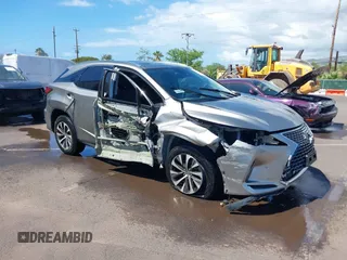 2020 Lexus RX with VIN 2T2HZMAA9LC163081, listed as a IAAI auction lot 41627232 with 38,153 mi miles. Bid and sale history available at carsss.com. Image 1.