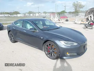 2020 Tesla Model S Performance with VIN 5YJSA1E49LF352569, listed as a IAAI auction lot 41713554 with Not provided miles and . Bid and sale history available at DreamBid. Image 1.