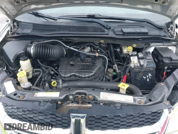 2012 Dodge Grand Caravan SXT with VIN 2C4RDGCG3CR308173, listed as a IAAI auction lot 42255879 with 96,489 mi miles and . Bid and sale history available at DreamBid. Image 10.