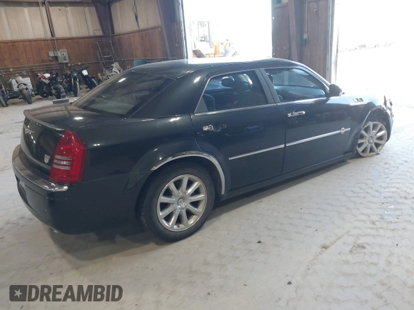 2006 Chrysler 300 C with VIN 2C3KA63H06H421414, listed as a IAAI auction lot 42144274 with 118,692 mi miles. Bid and sale history available at carsss.com. Image 4.