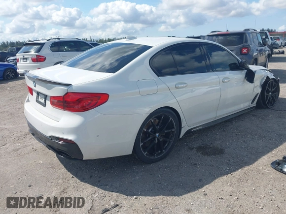 2018 BMW 5 Series 540i with VIN WBAJE5C50JWA95412, listed as a IAAI auction lot 41502258 with 74,150 mi miles and . Bid and sale history available at carsss.com. Image 4.