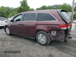 2014 Honda Odyssey LX z VIN 5FNRL5H24EB098072, wystawiony jako Copart lot #57577385 z przebiegiem 215 069 mil mil oraz Szkoda całkowita • Salvage title. Historia ofert i sprzedaży dostępna na DreamBid. Obrazek 2.