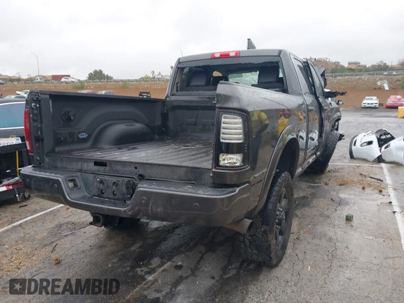 2018 Ram 2500 Laramie with VIN 3C6UR5FL6JG382481, listed as a IAAI auction lot 41517536 with Not provided miles and . Bid and sale history available at DreamBid. Image 4.