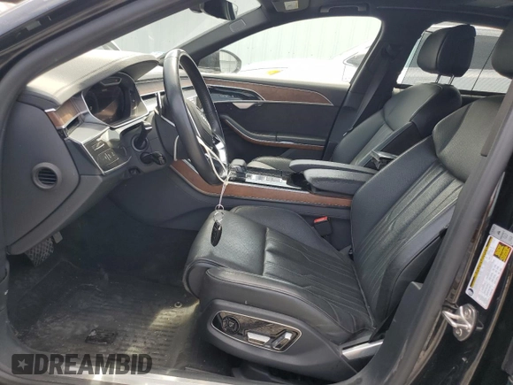 2019 Audi A8 with VIN WAU8DAF88KN016914, listed as a Copart auction lot 57621665 with 47,647 mi miles and Salvage title. Bid and sale history available at DreamBid. Image 7.