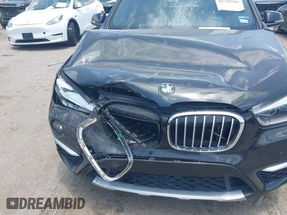 2017 BMW X1 xDrive28i with VIN WBXHT3Z30H4A65417, listed as a IAAI auction lot 42328797 with 103,788 mi miles and . Bid and sale history available at DreamBid. Image 6.
