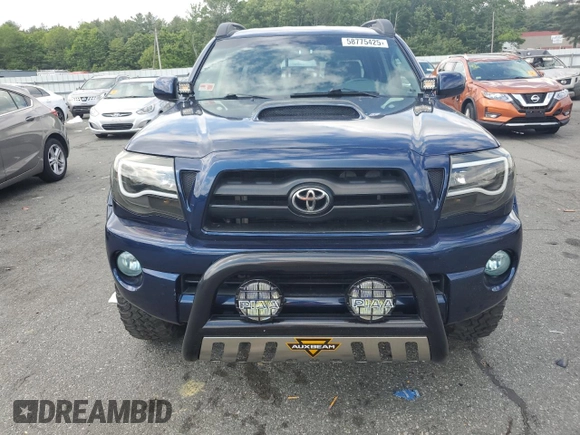 2005 Toyota Tacoma z VIN 5TEMU52N55Z126664, wystawiony jako Copart lot #58775425 z przebiegiem 233 069 mil mil oraz Szkoda całkowita • Salvage title. Historia ofert i sprzedaży dostępna na DreamBid. Obrazek 5.