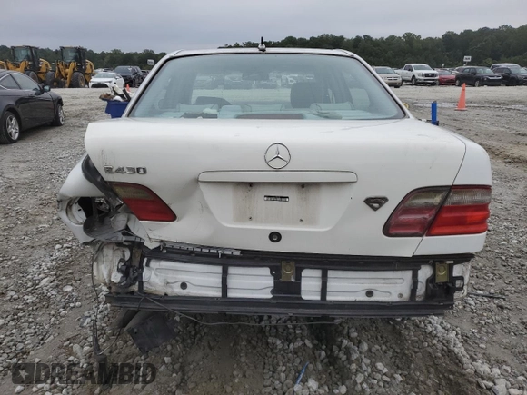 2000 Mercedes-Benz E-Class with VIN WDBJF70J1YB078418, listed as a Copart auction lot 71177244 with 189,838 mi miles and Salvage Title. Bid and sale history available at carsss.com. Image 6.