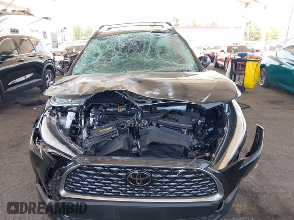 2023 Toyota Corolla Cross XLE with VIN 7MUDAAAG8PV072030, listed as a IAAI auction lot 42397573 with 6,584 mi miles and . Bid and sale history available at DreamBid. Image 11.