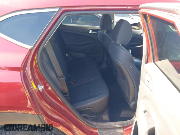 2019 Hyundai Tucson SE with VIN KM8J2CA41KU926156, listed as a IAAI auction lot 41888461 with 91,094 mi miles. Bid and sale history available at carsss.com. Image 8.