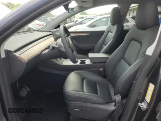 2024 Tesla Model Y Long Range с VIN 7SAYGDEE1RA234222, выставлен на аукционе Copart как лот 55139025 с пробегом 17 829 миль миль и Списание • Salvage title. История ставок и продаж доступна на DreamBid. Изображение 7.