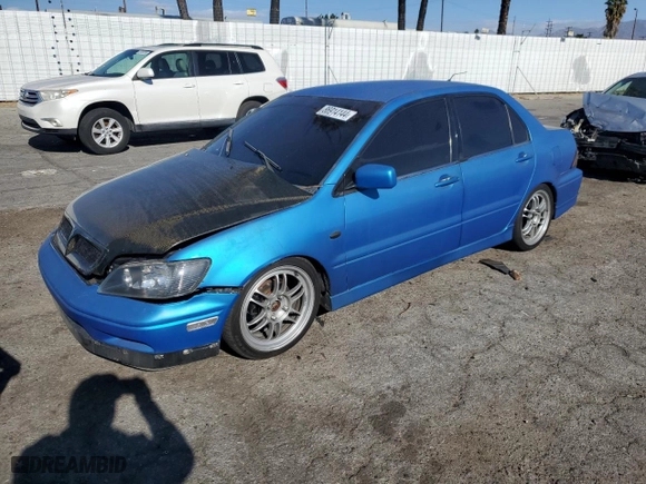 2002 Mitsubishi Lancer OZ-Rally with VIN JA3AJ86E62U070034, listed as a Copart auction lot 86914144 with 180,675 mi miles and Salvage Title. Bid and sale history available at carsss.com. Image 1.