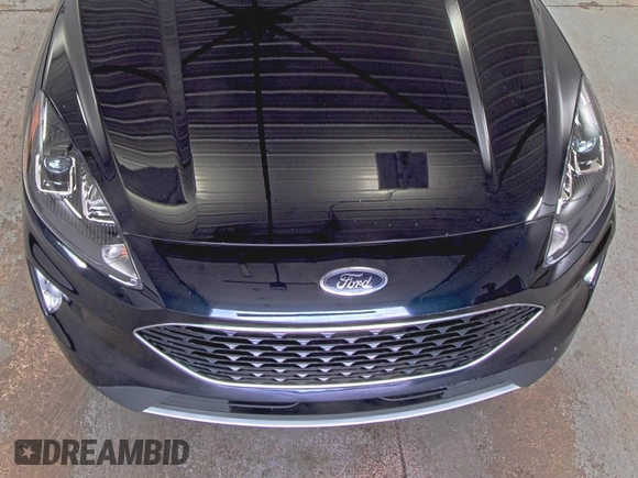 2021 Ford Escape SEL Hybrid with VIN 1FMCU9CZ0MUB25820, listed as a IAAI auction lot 42730204 with 66,443 mi miles and . Bid and sale history available at DreamBid. Image 1.
