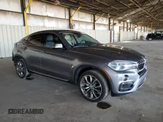 2015 BMW X6 xDrive35i with VIN 5UXKU2C59F0N77312, listed as a Copart auction lot 63591123 with 121,105 mi miles. Bid and sale history available at carsss.com. Image 4.