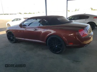 2007 Bentley Continental GT with VIN SCBDR33W77C047935, listed as a Copart auction lot 60557985 with 61,661 mi miles and Salvage title. Bid and sale history available at DreamBid. Image 2.