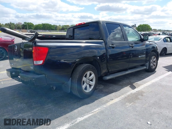 2005 Nissan Titan SE with VIN 1N6AA07A05N501283, listed as a IAAI auction lot 39151799 with 129,069 mi miles and . Bid and sale history available at DreamBid. Image 4.