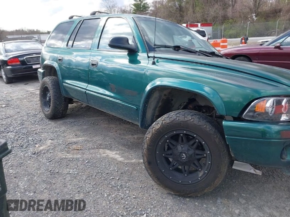 2003 Dodge Durango SLT with VIN 1D4HS48N93F574458, listed as a IAAI auction lot 41887140 with 281,567 mi miles and . Bid and sale history available at DreamBid. Image 1.