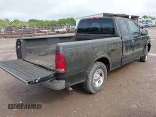 2003 Ford F-150 XL with VIN 1FTRX17263NA23449, listed as a IAAI auction lot 42111505 with 1 mi miles. Bid and sale history available at carsss.com. Image 4.