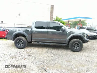 2017 Ford F-150 Raptor with VIN 1FTFW1RG8HFA31164, listed as a IAAI auction lot 42125542 with 164,745 mi miles and . Bid and sale history available at carsss.com. Image 13.