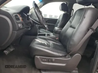 2012 GMC Yukon SLT with VIN 1GKS1CE04CR158460, listed as a Copart auction lot 84459174 with 153,662 mi miles and Salvage Title. Bid and sale history available at carsss.com. Image 7.