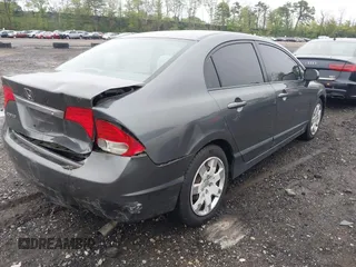 2010 Honda Civic LX with VIN 2HGFA1F59AH326233, listed as a IAAI auction lot 42190935 with 61,378 mi miles and . Bid and sale history available at DreamBid. Image 4.