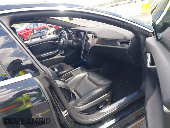 2015 Tesla Model S 85D with VIN 5YJSA1H21FFP79565, listed as a IAAI auction lot 42076401 with 162,139 mi miles. Bid and sale history available at carsss.com. Image 5.