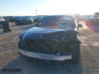 2014 Mercedes-Benz E-Class E 350 Sport with VIN WDDHF5KB2EB038828, listed as a IAAI auction lot 41238332 with 180,580 mi miles. Bid and sale history available at carsss.com. Image 6.
