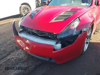 2009 Nissan 370Z Touring with VIN JN1AZ44E19M401881, listed as a IAAI auction lot 41183986 with 127,000 mi miles and . Bid and sale history available at DreamBid. Image 6.