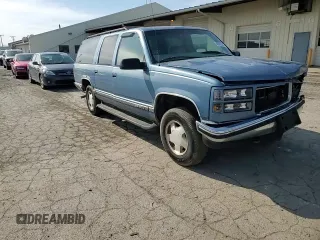 1997 GMC Suburban with VIN 1GKFK16R7VJ707618, listed as a Copart auction lot 49882035 with 317,771 mi miles and Salvage Title. Bid and sale history available at carsss.com. Image 12.