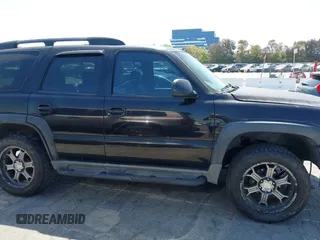 2001 Chevrolet Tahoe LT with VIN 1GNEK13T81R202598, listed as a IAAI auction lot 42007381 with 188,172 mi miles. Bid and sale history available at carsss.com. Image 13.