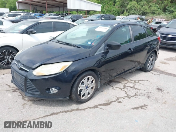 2012 Ford Focus SE with VIN 1FAHP3F28CL361932, listed as a IAAI auction lot 42142318 with 135,179 mi miles and . Bid and sale history available at carsss.com. Image 2.