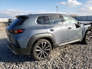 2023 Mazda CX-50 Premium Plus z VIN 7MMVABEY3PN106534, wystawiony jako Copart lot #68754472 z przebiegiem 4 110 mil mil oraz . Historia ofert i sprzedaży dostępna na DreamBid. Obrazek 3.