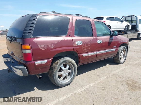 2001 GMC Yukon SLT with VIN 1GKEK13V81J100005, listed as a IAAI auction lot 42090494 with 276,042 mi miles. Bid and sale history available at carsss.com. Image 4.