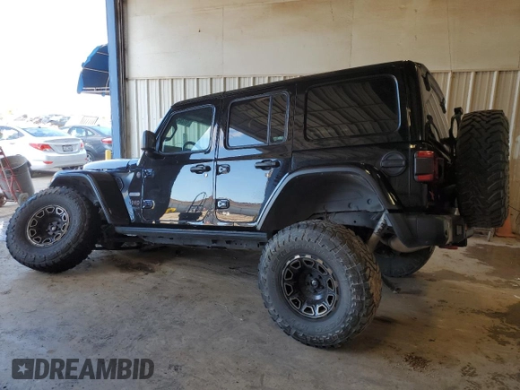 2020 Jeep Wrangler Unlimited Recon with VIN 1C4HJXFN0LW263201, listed as a Copart auction lot 79129424 with 73,405 mi miles and Salvage title. Bid and sale history available at DreamBid. Image 2.