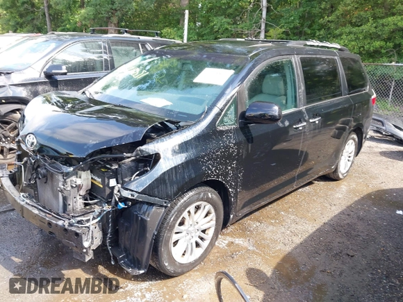 2015 Toyota Sienna XLE with VIN 5TDYK3DC8FS574645, listed as a IAAI auction lot 42528851 with 164,408 mi miles and . Bid and sale history available at DreamBid. Image 18.