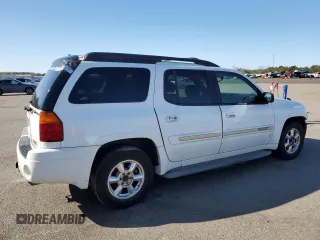 2003 GMC Envoy SLT z VIN 1GKET16S736179347, wystawiony jako Copart lot #52370775 z przebiegiem 230 623 mil mil oraz Szkoda całkowita • Salvage title. Historia ofert i sprzedaży dostępna na DreamBid. Obrazek 3.