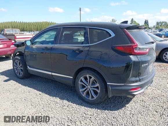 2021 Honda CR-V Touring with VIN 2HKRW2H96MH681908, listed as a IAAI auction lot 42082535 with 65,570 mi miles and . Bid and sale history available at DreamBid. Image 3.