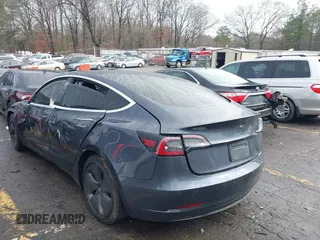 2019 Tesla Model 3 Mid Range with VIN 5YJ3E1EA3KF426971, listed as a IAAI auction lot 41564939 with Not Provided miles and . Bid and sale history available at carsss.com. Image 3.