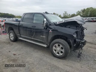 2023 Ram 2500 Laramie with VIN 3C6UR5FL4PG580565, listed as a Copart auction lot 71935344 with 13,939 mi miles and Salvage Title. Bid and sale history available at carsss.com. Image 4.
