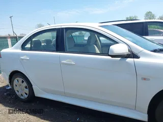 2011 Mitsubishi Lancer ES with VIN JA32U2FU0BU001081, listed as a IAAI auction lot 42092629 with 237,072 mi miles. Bid and sale history available at carsss.com. Image 12.