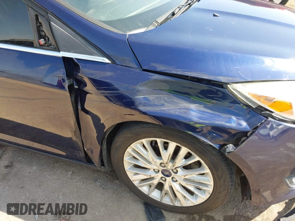2017 Ford Focus Titanium with VIN 1FADP3J29HL204892, listed as a IAAI auction lot 42032705 with 119,028 mi miles and . Bid and sale history available at DreamBid. Image 6.