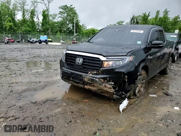 2023 Honda Ridgeline RTL with VIN 5FPYK3F51PB067811, listed as a Copart auction lot 56795995 with 21,500 mi miles and Salvage title. Bid and sale history available at DreamBid. Image 13.