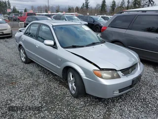 2002 Mazda Protege DX with VIN JM1BJ225920613750, listed as a IAAI auction lot 41612308 with 165,746 mi miles and . Bid and sale history available at DreamBid. Image 1.
