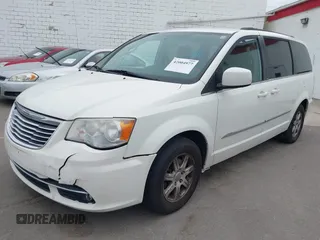 2013 Chrysler Town & Country Touring with VIN 2C4RC1BG4DR648838, listed as a IAAI auction lot 42004977 with 218,814 mi miles. Bid and sale history available at carsss.com. Image 2.