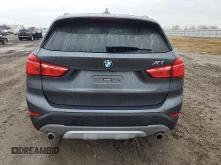 2017 BMW X1 sDrive28i with VIN WBXHU7C3XH5H38074, listed as a Copart auction lot 43088995 with 98,820 mi miles and Salvage Title. Bid and sale history available at carsss.com. Image 6.