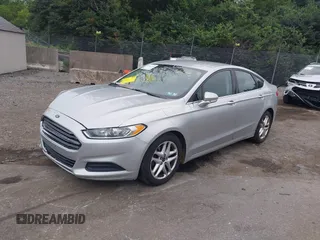 2015 Ford Fusion SE with VIN 3FA6P0H77FR210715, listed as a IAAI auction lot 42607234 with 141,794 mi miles and . Bid and sale history available at DreamBid. Image 2.