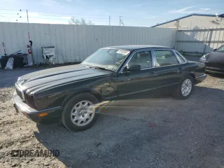 2002 Jaguar XJ 8 with VIN SAJDA14CX2LF40535, listed as a Copart auction lot 78708334 with 74,862 mi miles and Salvage title. Bid and sale history available at DreamBid. Image 1.