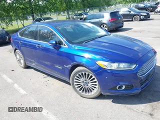 2014 Ford Fusion Titanium Hybrid with VIN 3FA6P0RU1ER126683, listed as a IAAI auction lot 42721285 with 84,268 mi miles and . Bid and sale history available at DreamBid. Image 1.