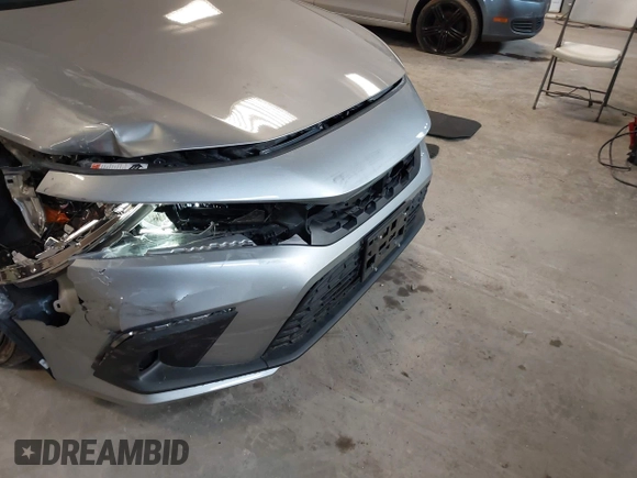 2023 Honda Civic Sport with VIN 19XFL2H80PE010679, listed as a IAAI auction lot 42026973 with 25,701 mi miles and . Bid and sale history available at DreamBid. Image 6.