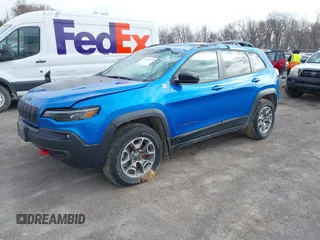 2022 Jeep Cherokee Trailhawk z VIN 1C4PJMBX1ND539319, wystawiony jako IAAI lot #41811178 z przebiegiem 49 922 mil mil oraz . Historia ofert i sprzedaży dostępna na DreamBid. Obrazek 18.